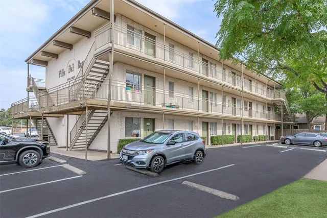 a car parked in front of a building