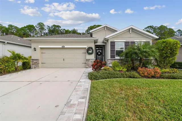 $448,900 | 32813 Sand Creek Drive, Wesley Chapel, FL 33543
