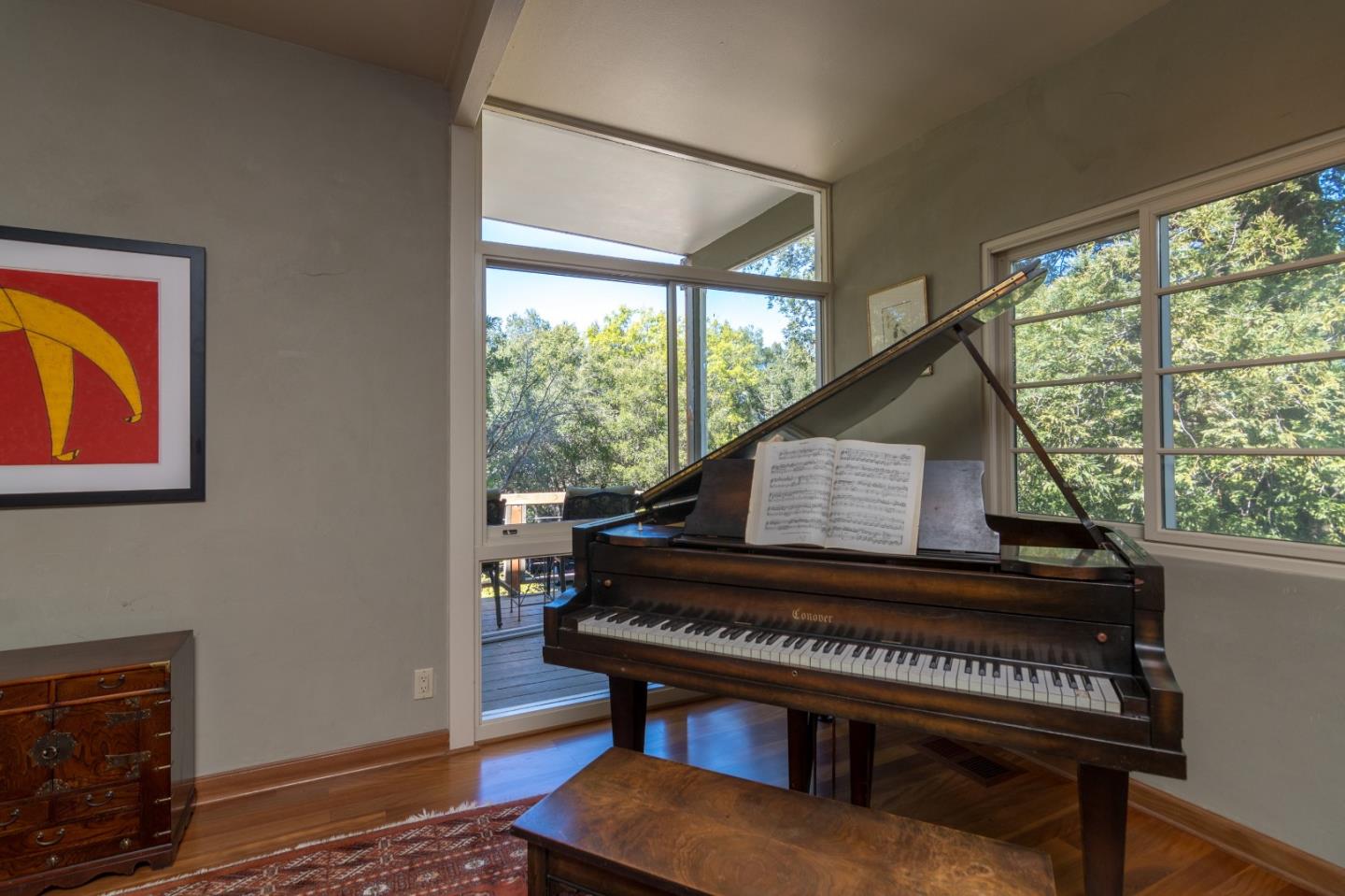 14795 Bohlman Road Saratoga, CA 95070 - Photo 11 of 50 a living room with furniture and a piano
