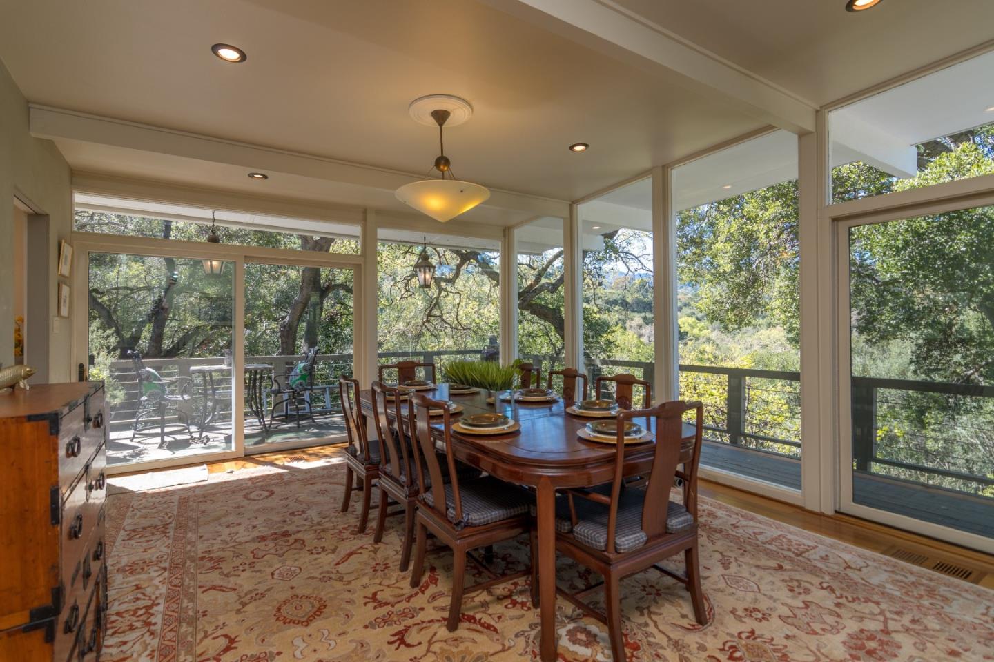 14795 Bohlman Road Saratoga, CA 95070 - Photo 12 of 50 a view of a dining room with furniture window and outside view