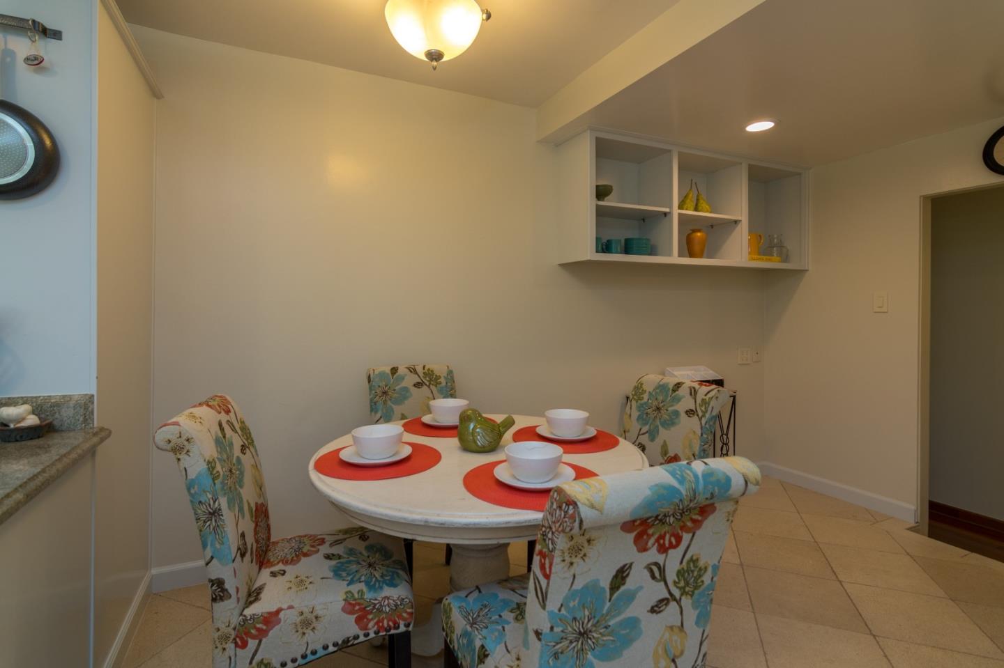 14795 Bohlman Road Saratoga, CA 95070 - Photo 19 of 50 a view of a dining room with furniture and wooden floor