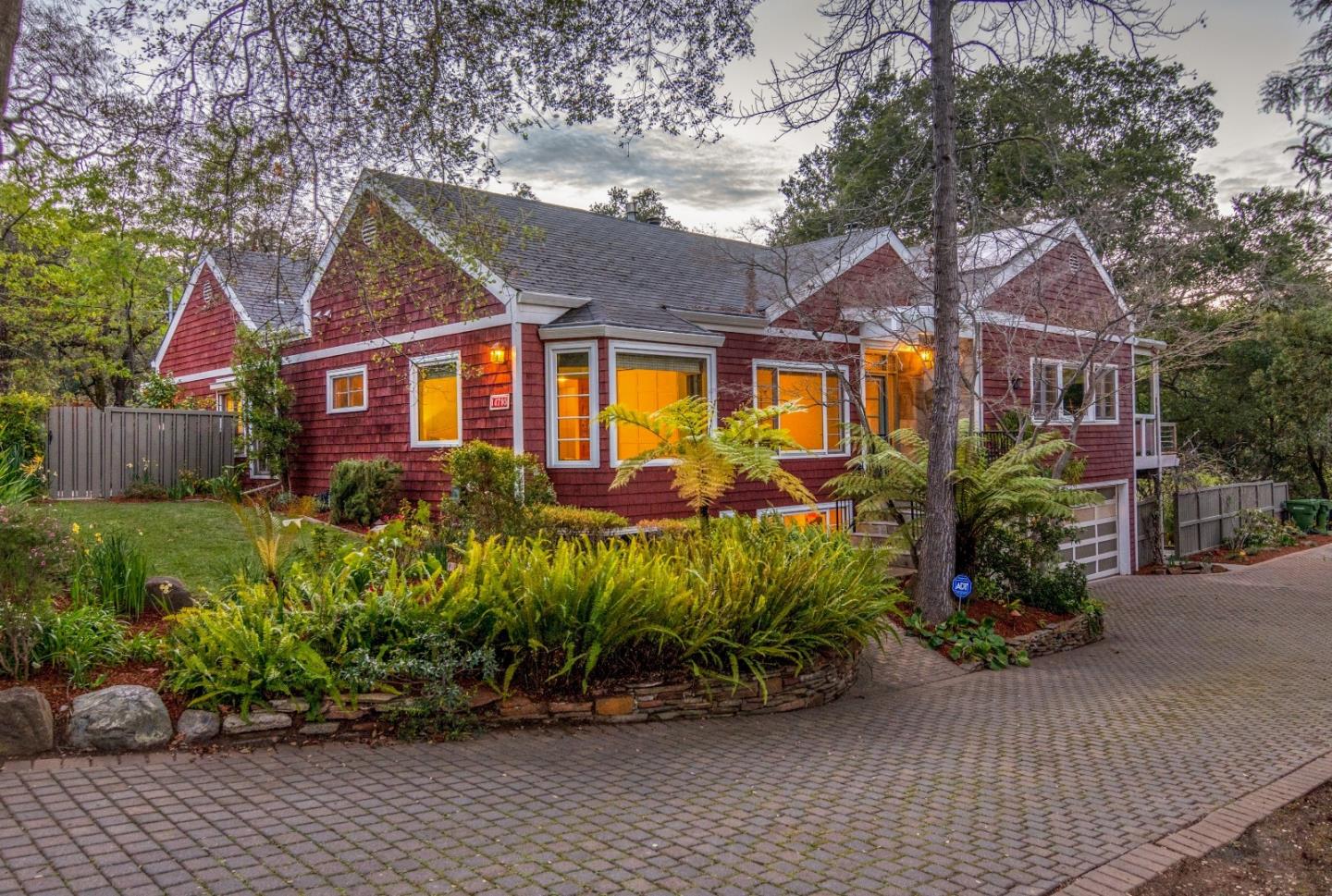 14795 Bohlman Road Saratoga, CA 95070 - Photo 2 of 50 front view of a house with a garden