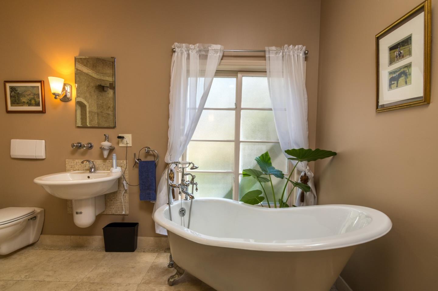 14795 Bohlman Road Saratoga, CA 95070 - Photo 33 of 50 a white bath tub sitting next to a white sink