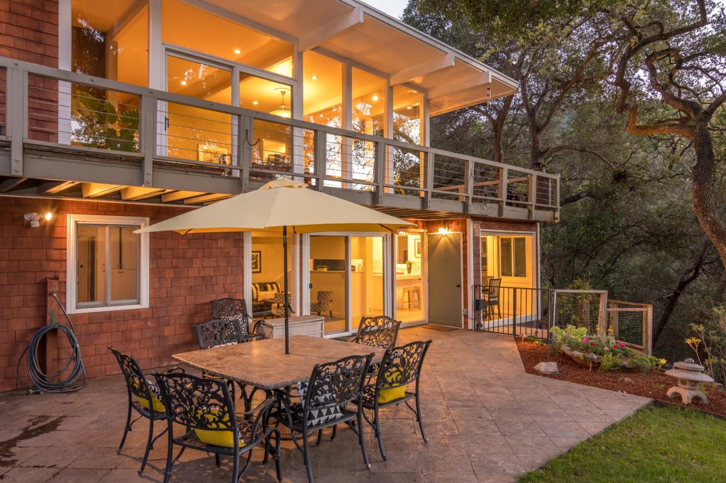 14795 Bohlman Road Saratoga, CA 95070 - Photo 44 of 50 a view of a patio with table and chairs and potted plants