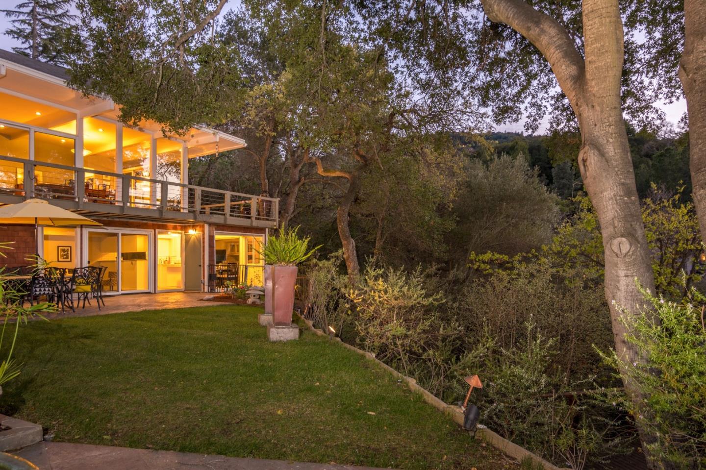 14795 Bohlman Road Saratoga, CA 95070 - Photo 50 of 50 a view of a yard with plants and a bench in a yard