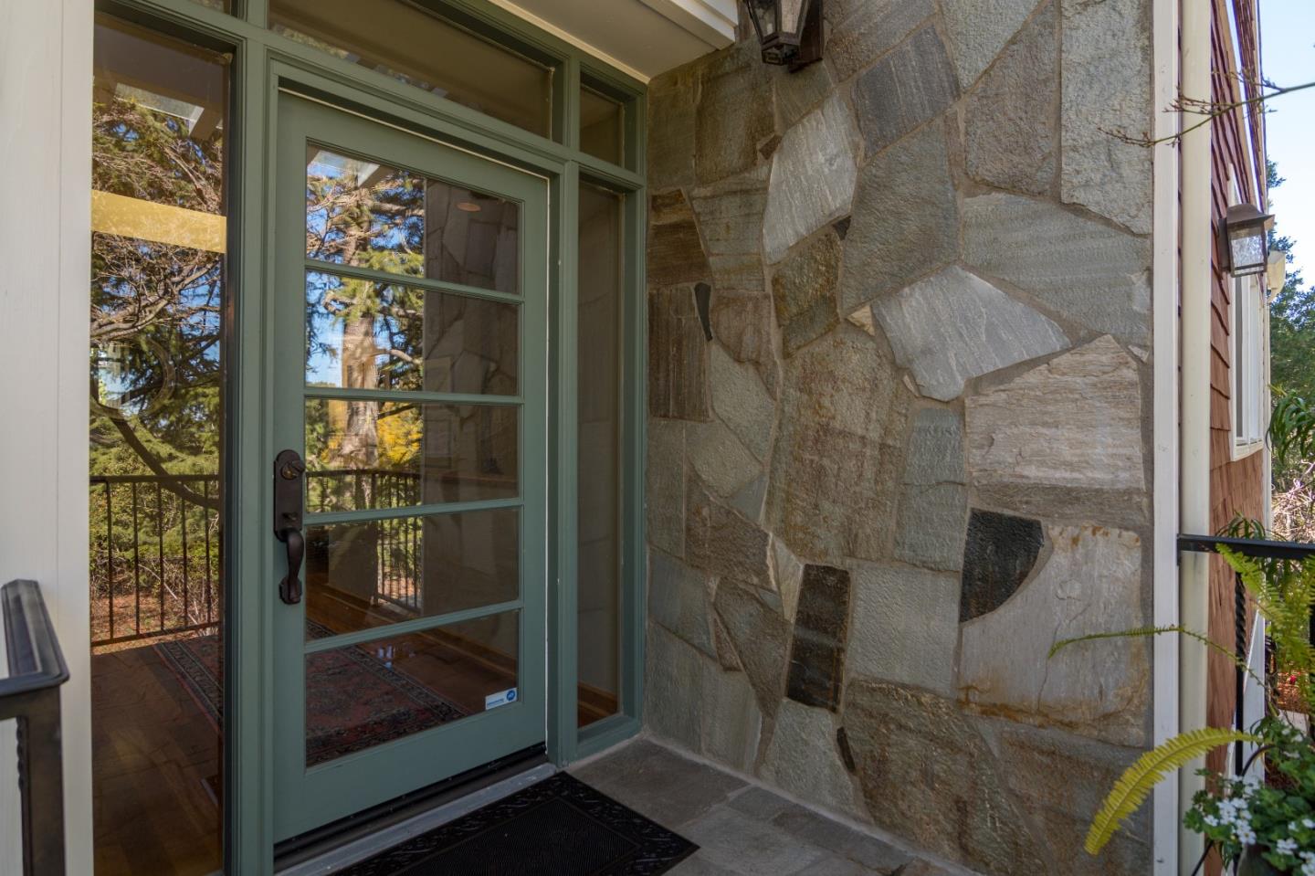 14795 Bohlman Road Saratoga, CA 95070 - Photo 6 of 50 a bathroom with a glass shower door