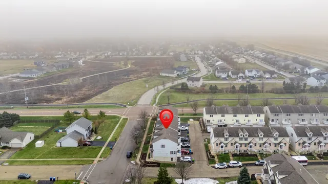an aerial view of beach and residential houses