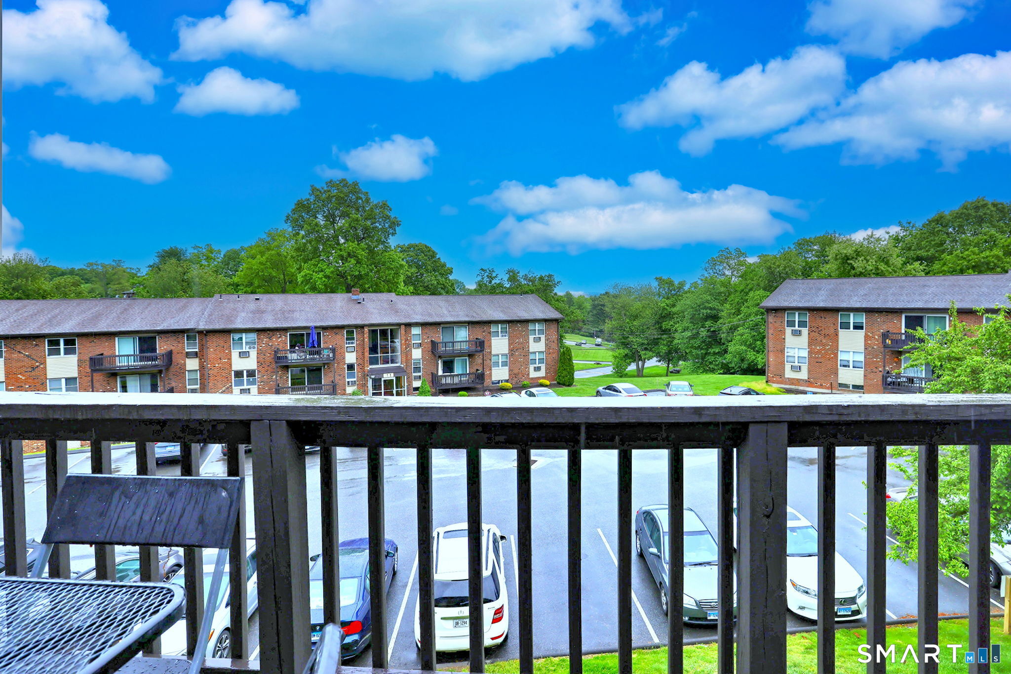 43 Balance Rock Road, Unit 11 Seymour, CT 06483 - Photo 36 of 40 a view of a roof deck with wooden fence and floor