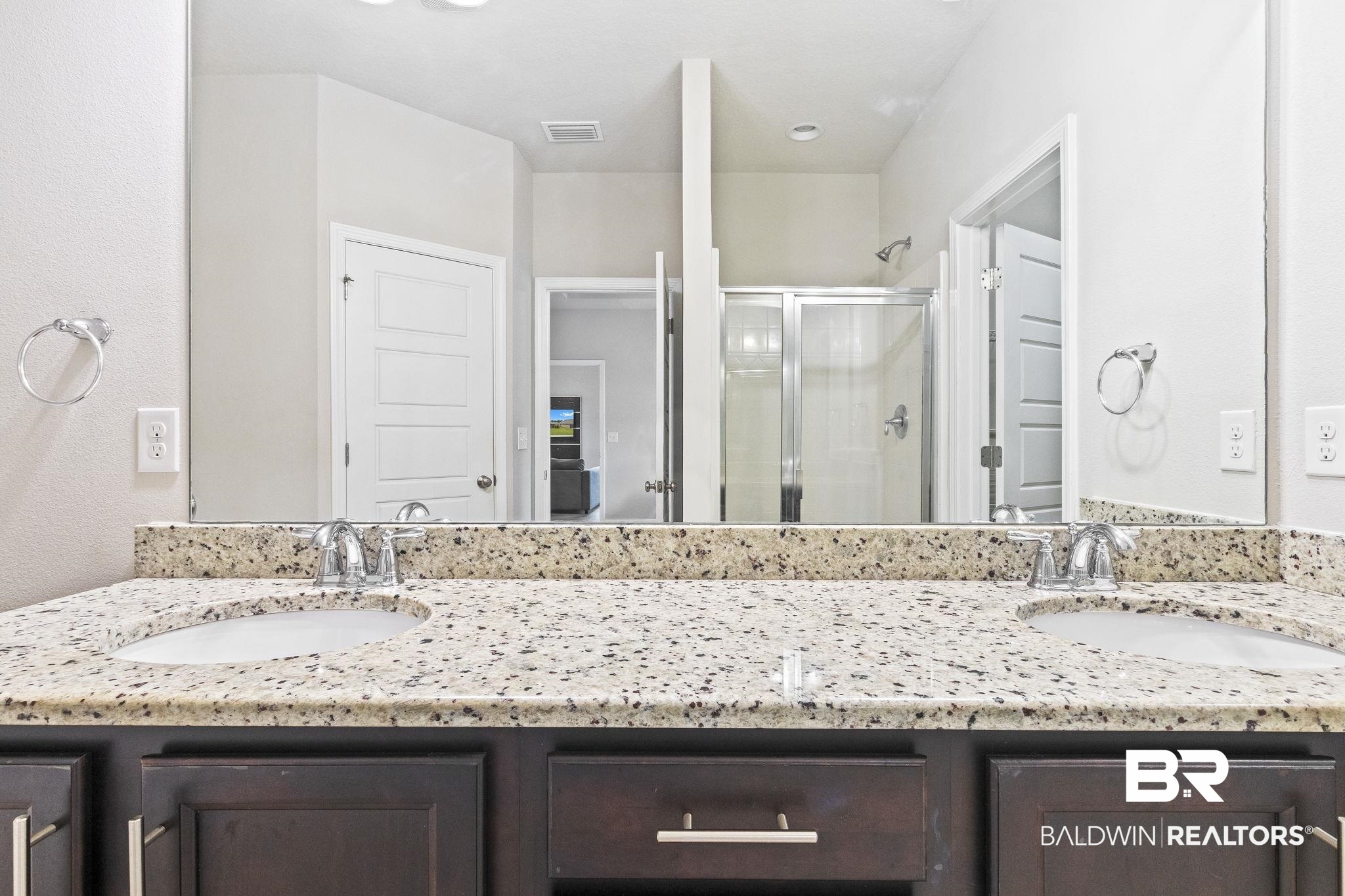31643 Kestrel Loop Daphne, AL 36527 - Photo 24 of 59 Bathroom featuring an enclosed shower and vanity