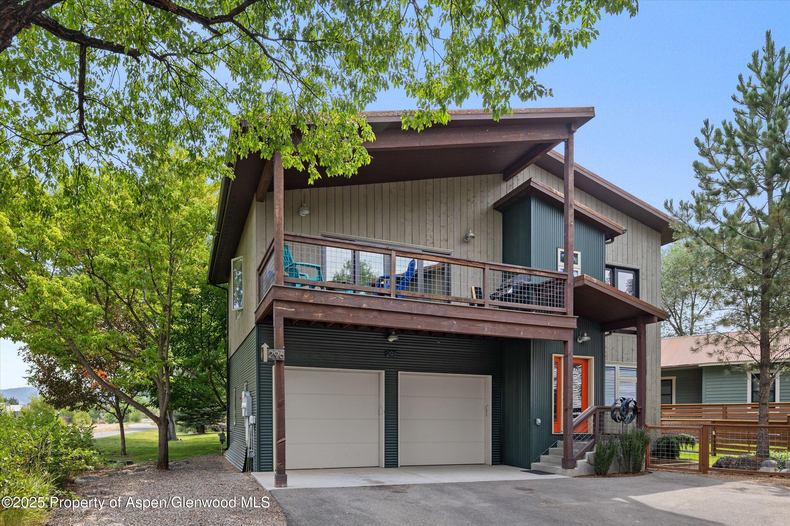 296-298 North 7th Street Carbondale, CO 81623 - Photo 3 of 11 a house view with a outdoor space