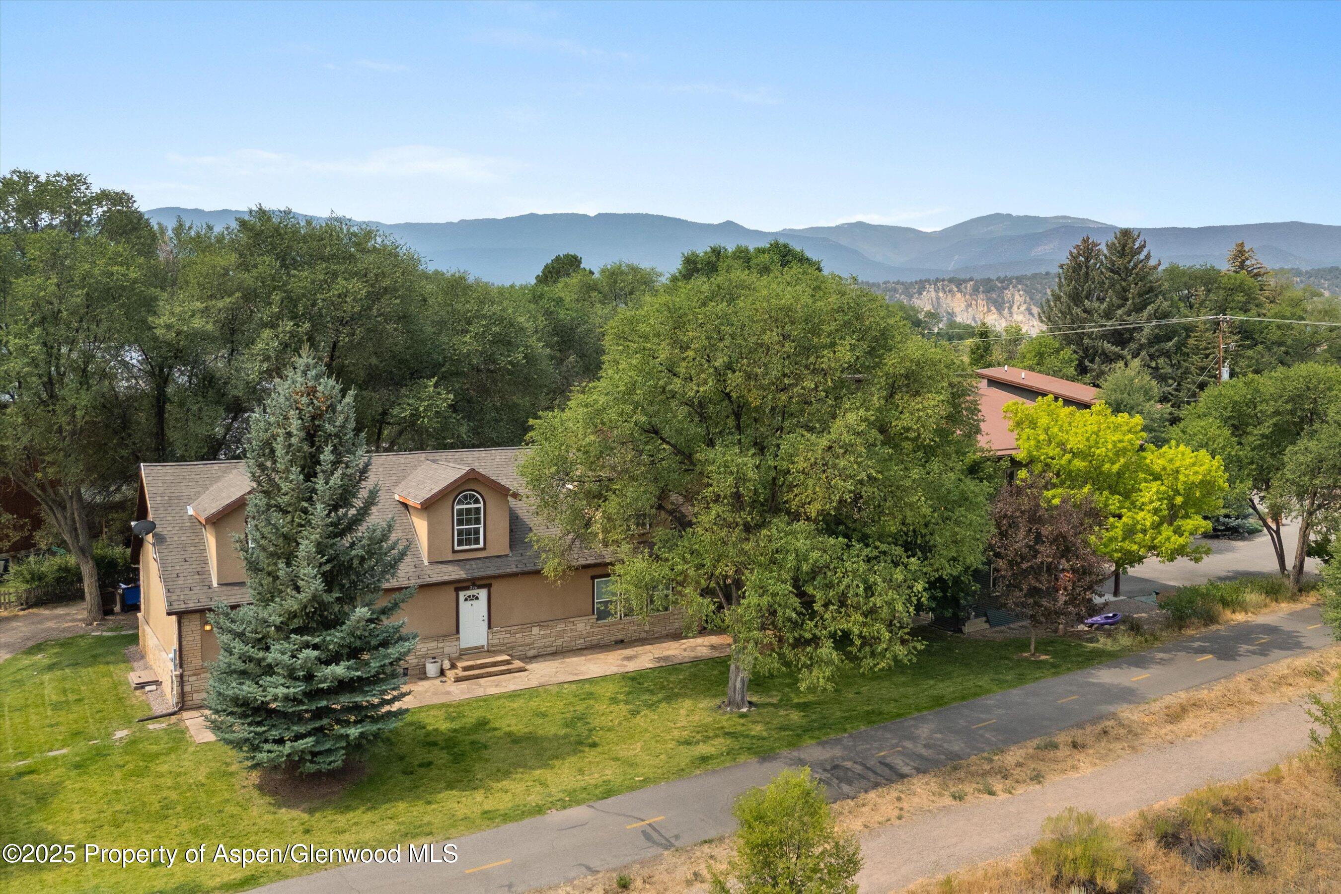 296-298 North 7th Street Carbondale, CO 81623 - Photo 4 of 11 an aerial view of a house with a garden