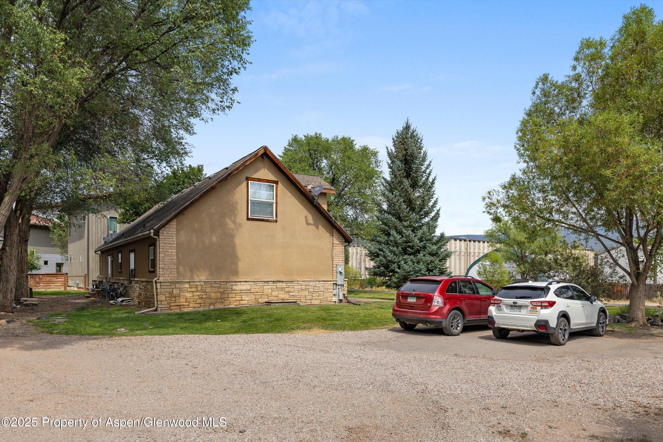 296-298 North 7th Street Carbondale, CO 81623 - Photo 7 of 11 a view of a car in front of house