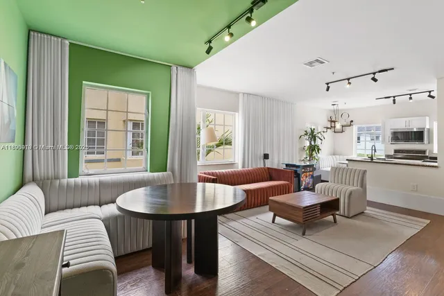 a living room with furniture and a table