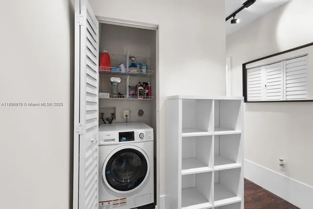 a room with cabinets and a window