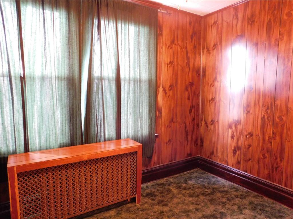 423 Alice Street Pittsburgh, PA 15210 - Photo 14 of 17 a view of a room with a window and a shower curtain
