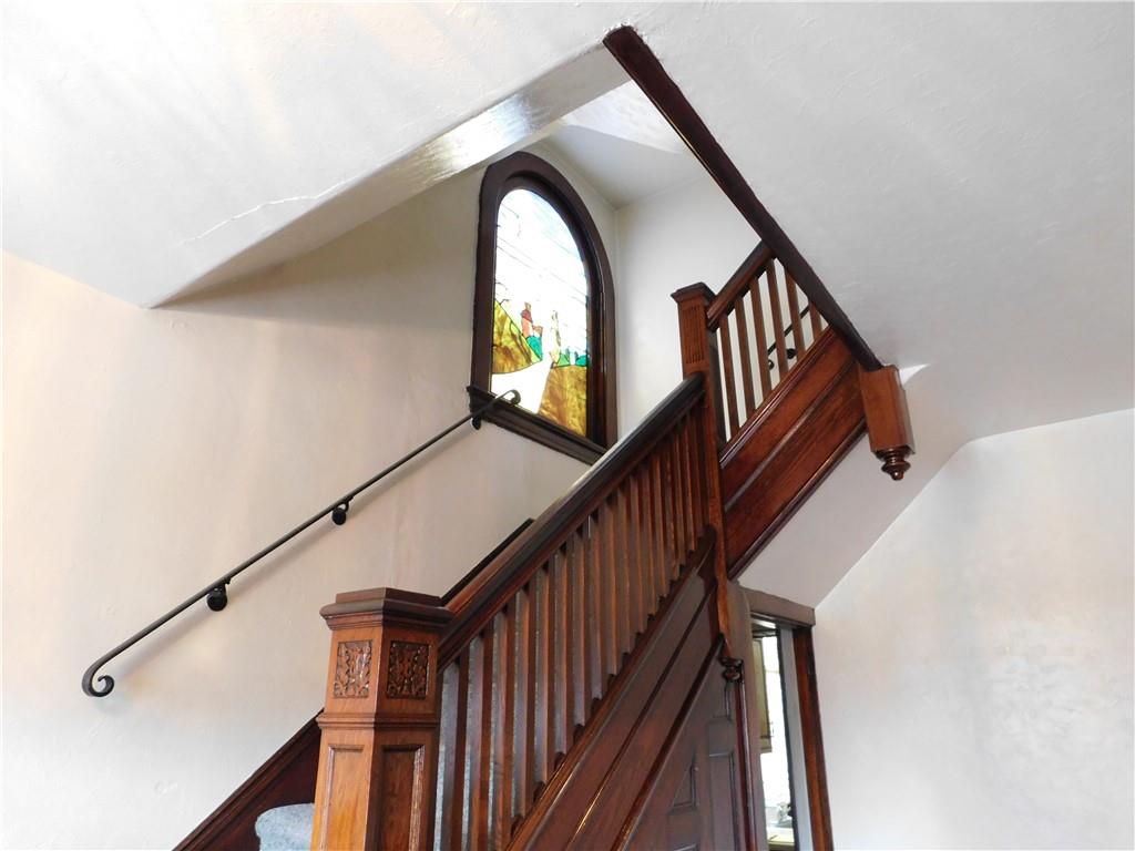 423 Alice Street Pittsburgh, PA 15210 - Photo 3 of 17 a view of staircase with railing and white walls