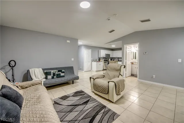 a living room with furniture and a couch