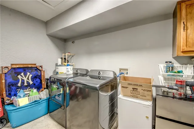 a storage room with washer and dryer