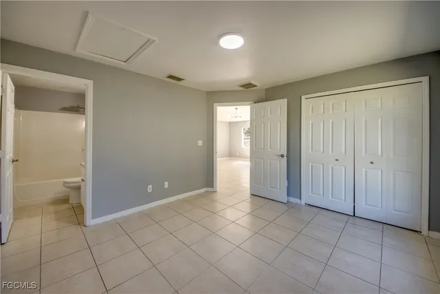 a view of a bathroom with a shower and a toilet