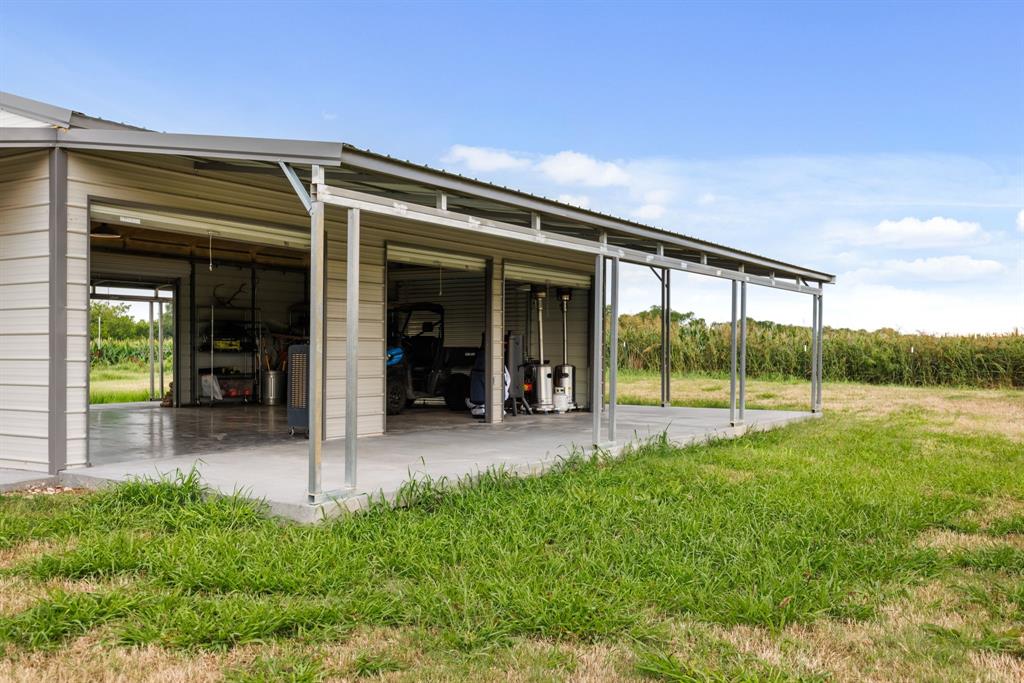 300 Grellhesl Road West, TX 76691 - Photo 4 of 35 a view of a house with backyard and porch