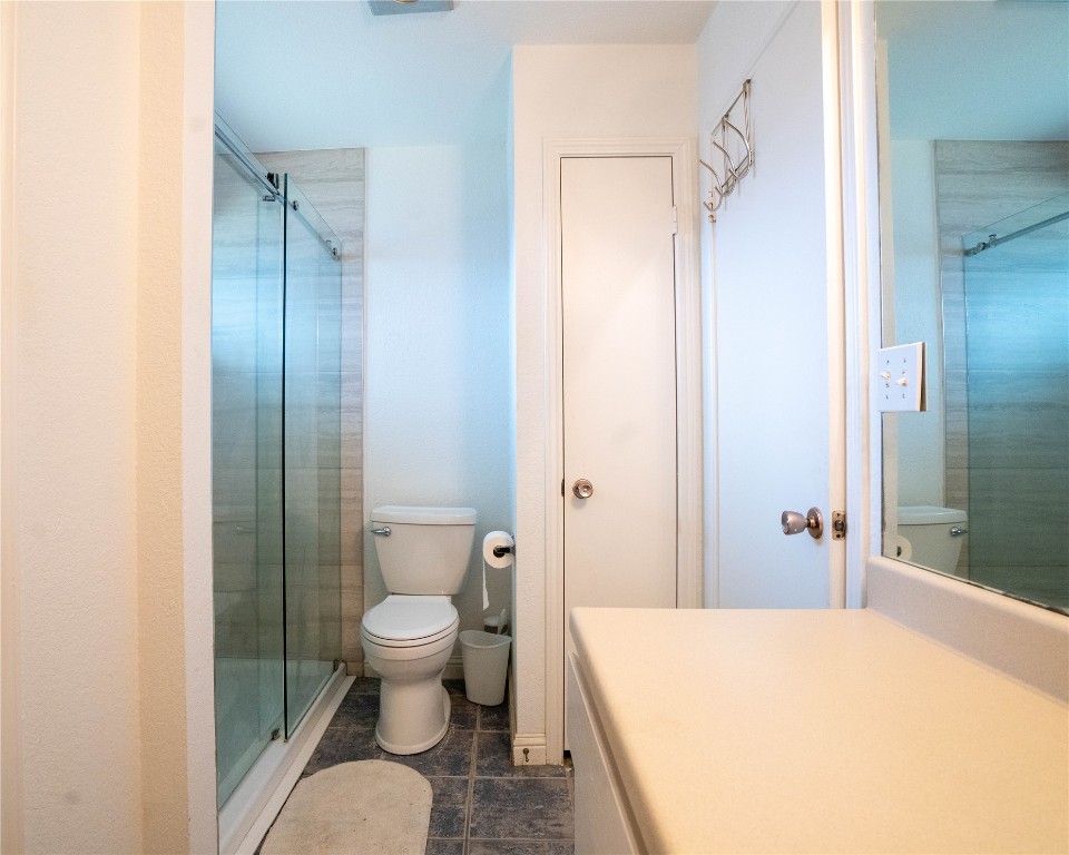 611 Penny Lane Cedar Park, TX 78613 - Photo 14 of 28 a bathroom with a sink and toilet