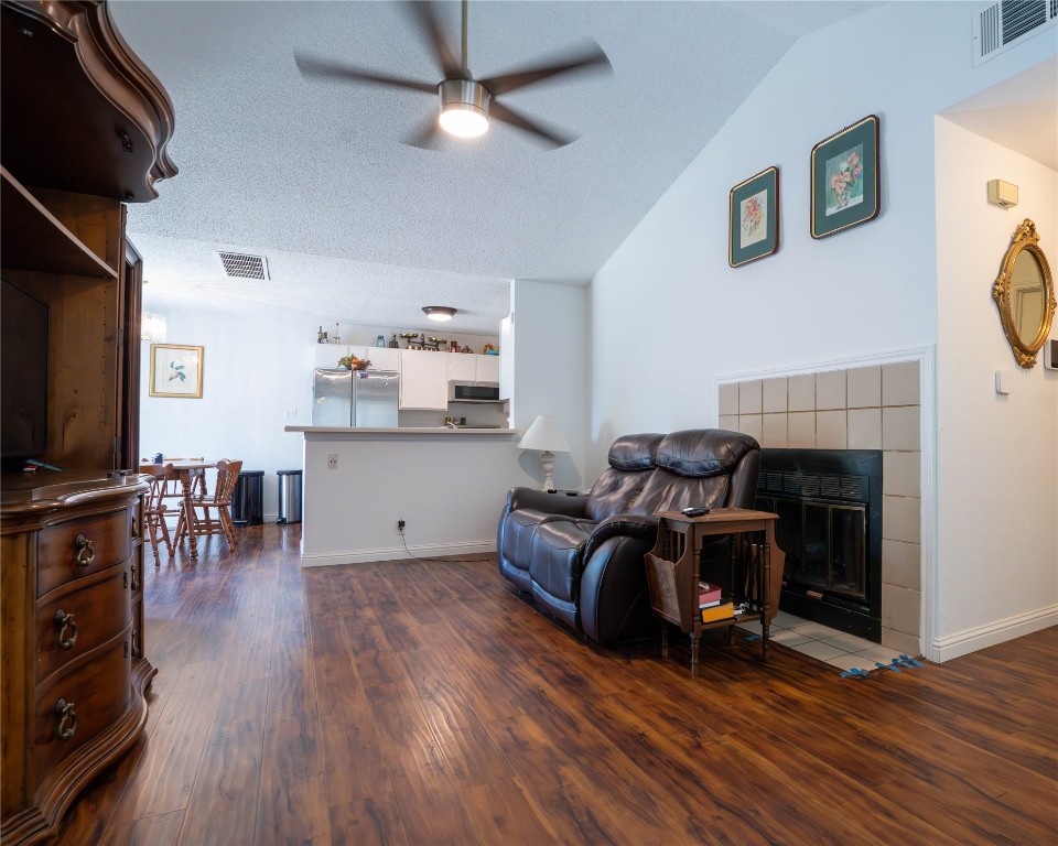 611 Penny Lane Cedar Park, TX 78613 - Photo 5 of 28 a living room with furniture and a fireplace