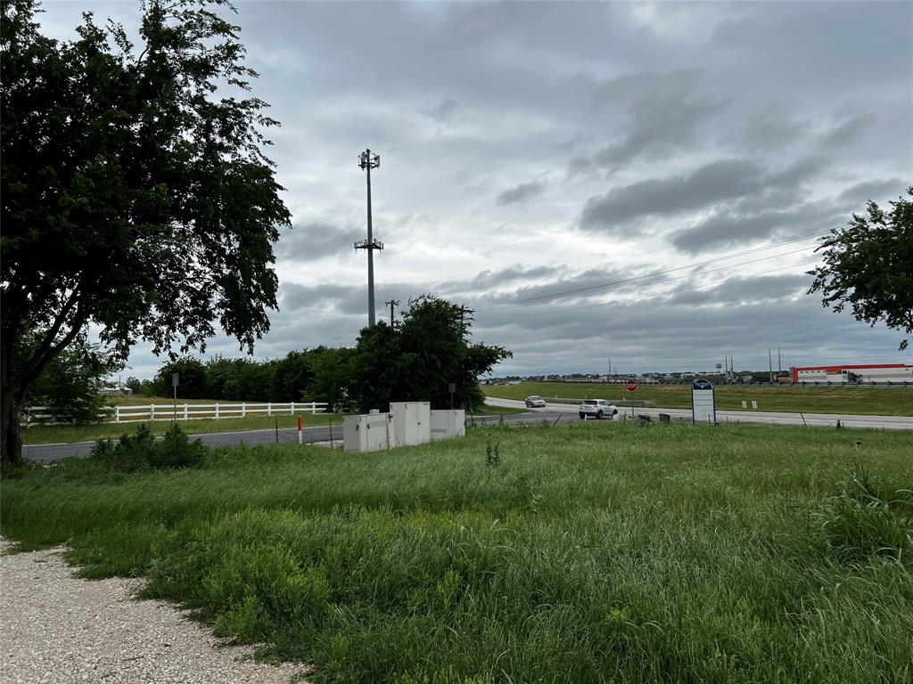 13501 Bates Aston Road Haslet, TX 76052 - Photo 1 of 4 a view of a golf course with a lake