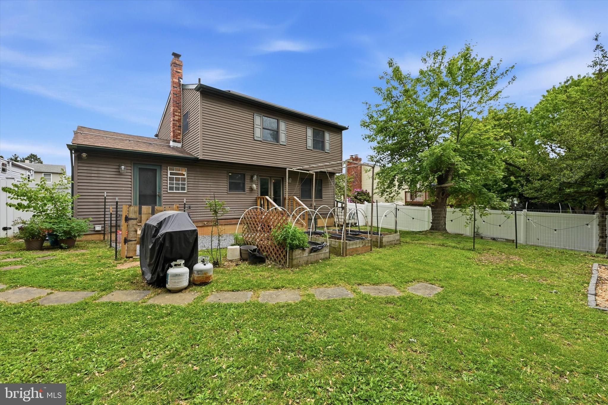 319 Willowbrook Road Upper Chichester, PA 19061 - Photo 24 of 24 a front view of house with yard and green space