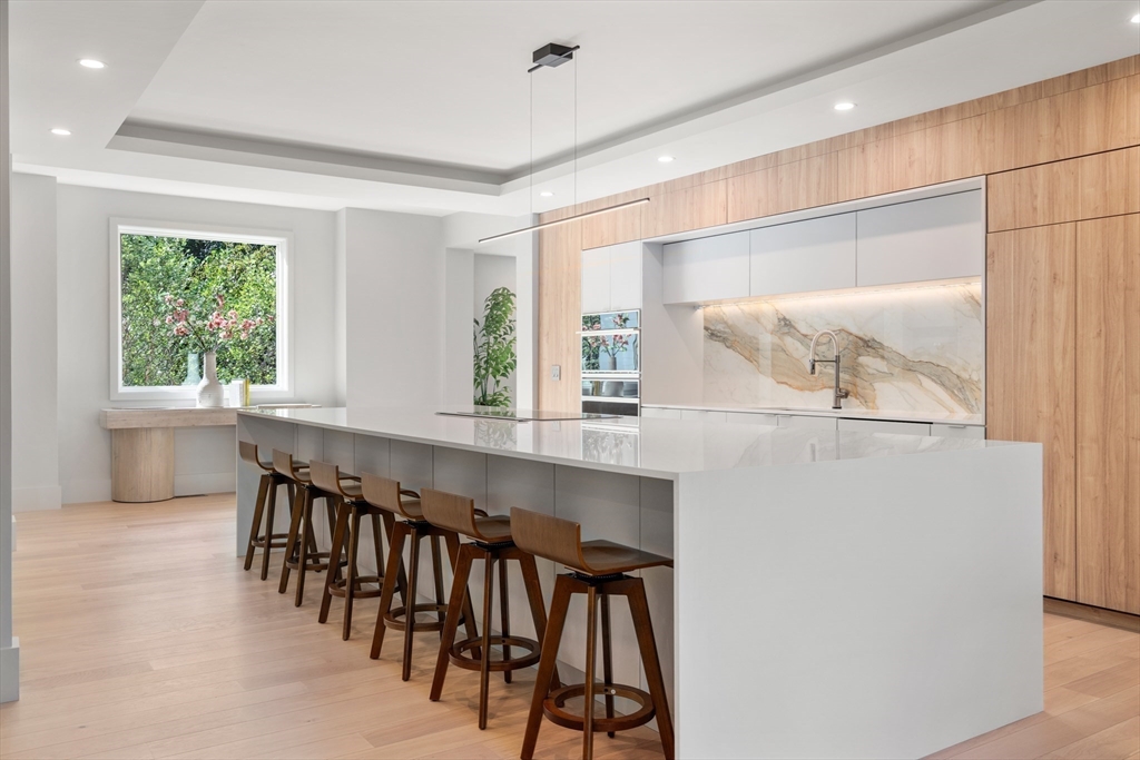 20 Old Farm Road Newton, MA 02459 - Photo 14 of 39 a kitchen with a table and chairs