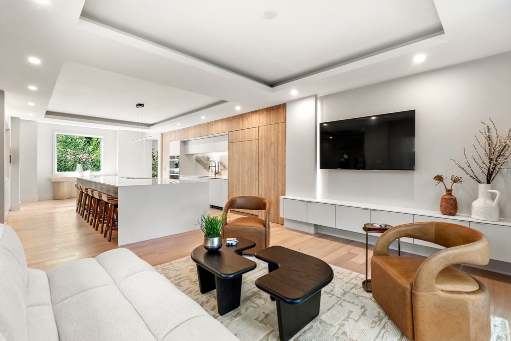 20 Old Farm Road Newton, MA 02459 - Photo 16 of 39 a living room with furniture and a flat screen tv
