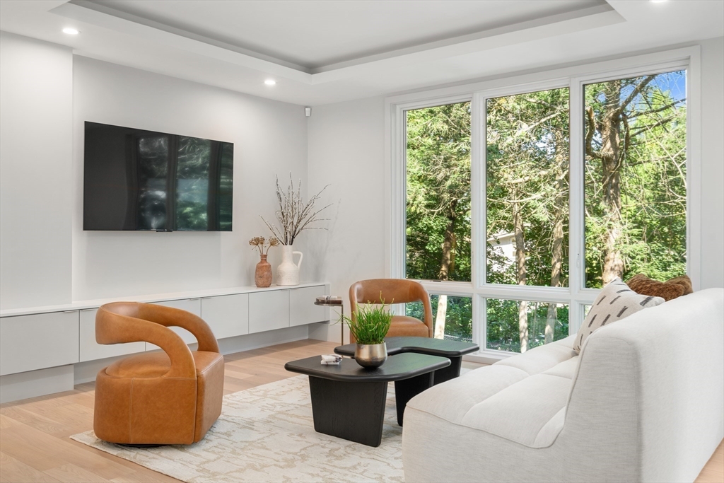 20 Old Farm Road Newton, MA 02459 - Photo 17 of 39 a living room with furniture and a large window