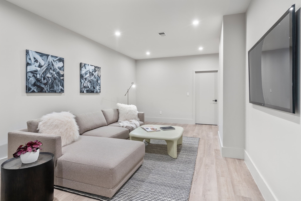 20 Old Farm Road Newton, MA 02459 - Photo 31 of 39 a living room with furniture and a wooden floor