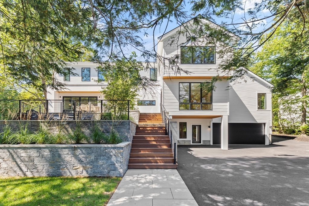 20 Old Farm Road Newton, MA 02459 - Photo 4 of 39 a front view of a house with a yard
