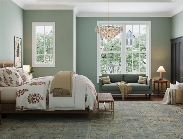 a spacious bedroom with a bed and a couch next to a window