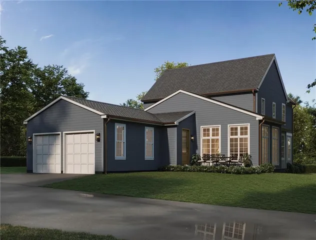 a room with lots of white furniture and painting on the wall