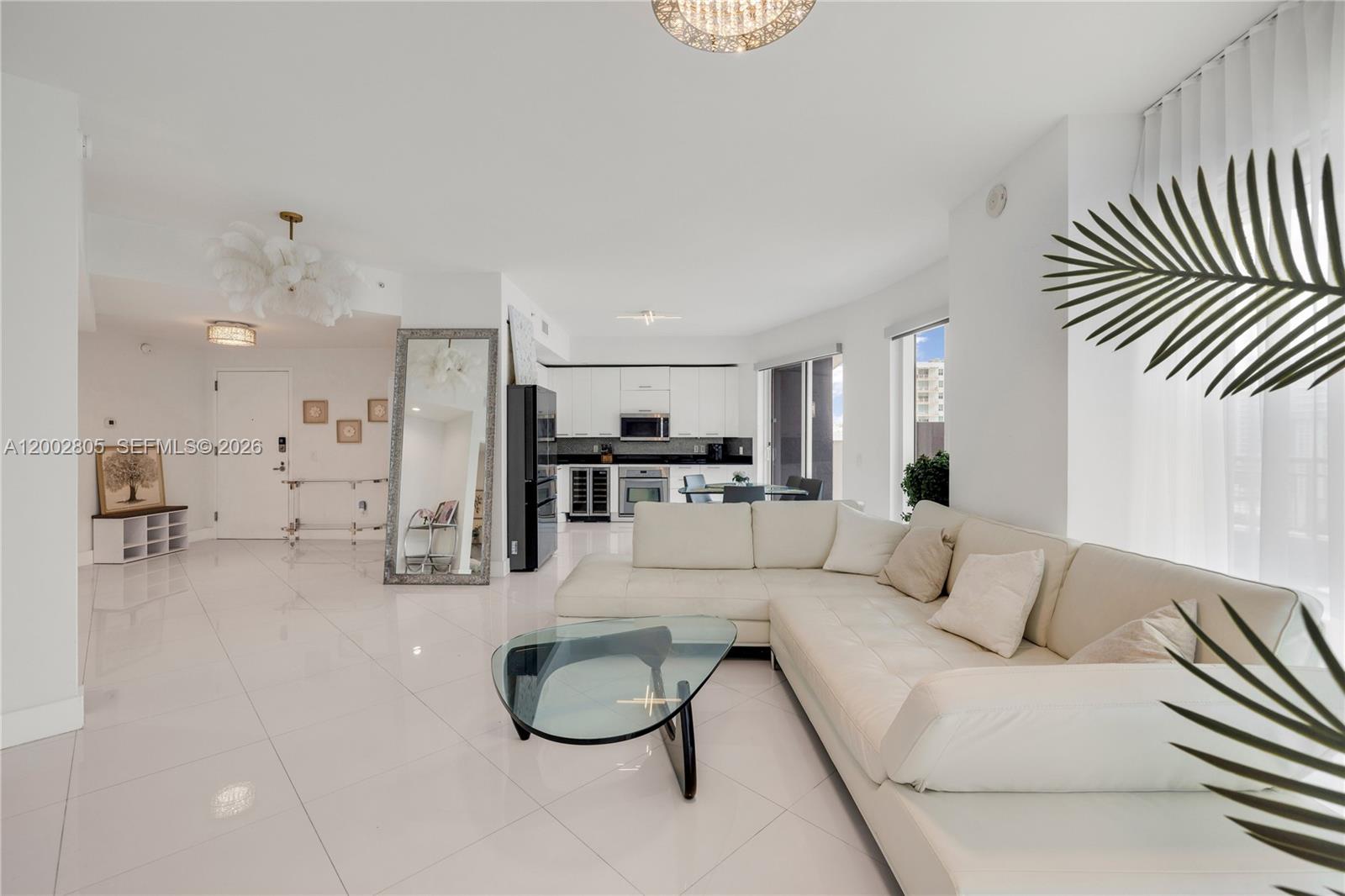 60 Southwest 13th Street, Unit 1124 Miami, FL 33130 - Photo 1 of 30 a living room with furniture and a table