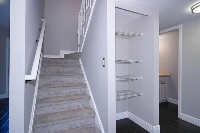 a view of a bathroom from a hallway