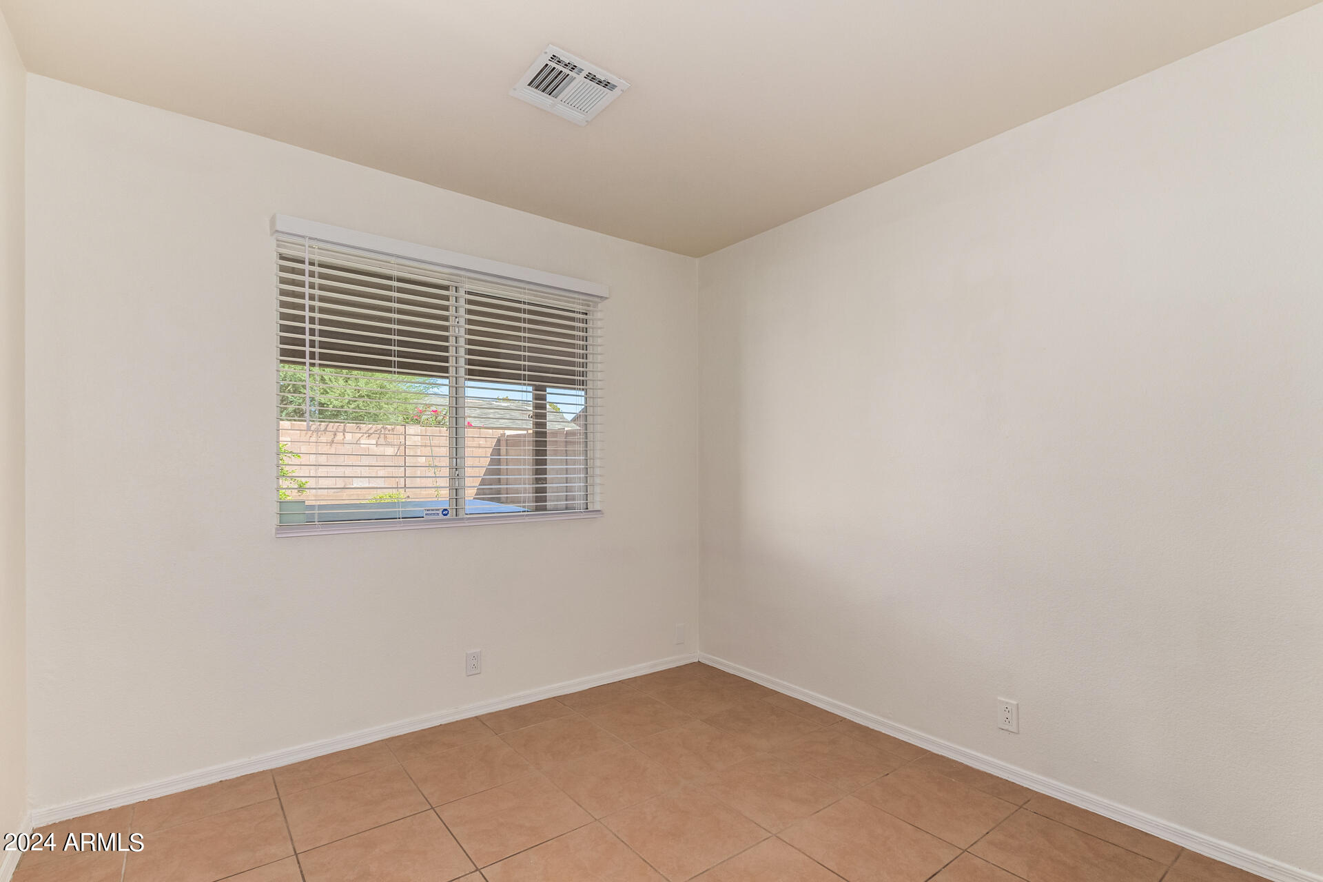 8342 West Monte Vista Road Phoenix, AZ 85037 - Photo 32 of 37 Bedroom 3