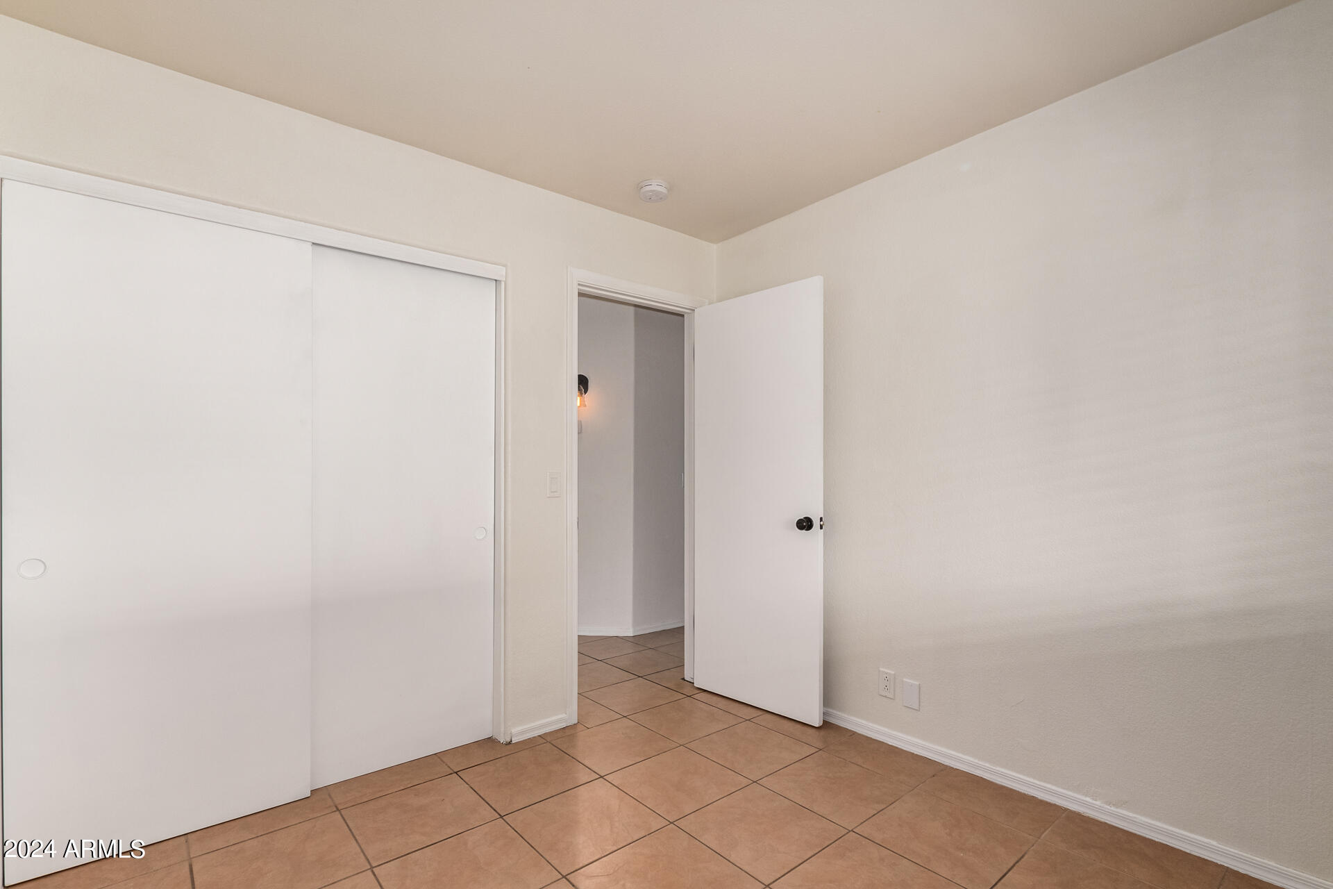 8342 West Monte Vista Road Phoenix, AZ 85037 - Photo 33 of 37 Bedroom 3 Empty