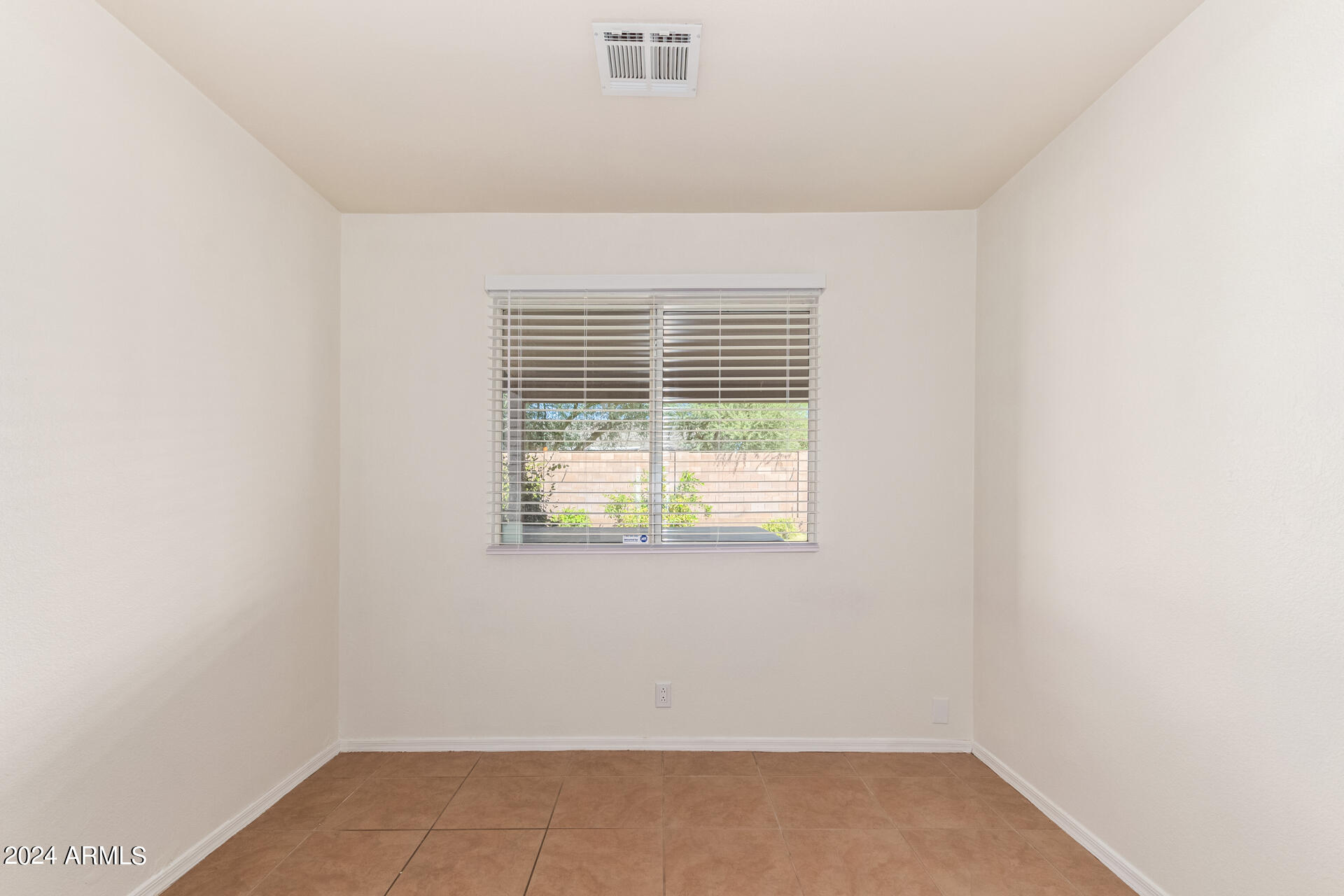 8342 West Monte Vista Road Phoenix, AZ 85037 - Photo 34 of 37 Bedroom 3 Empty
