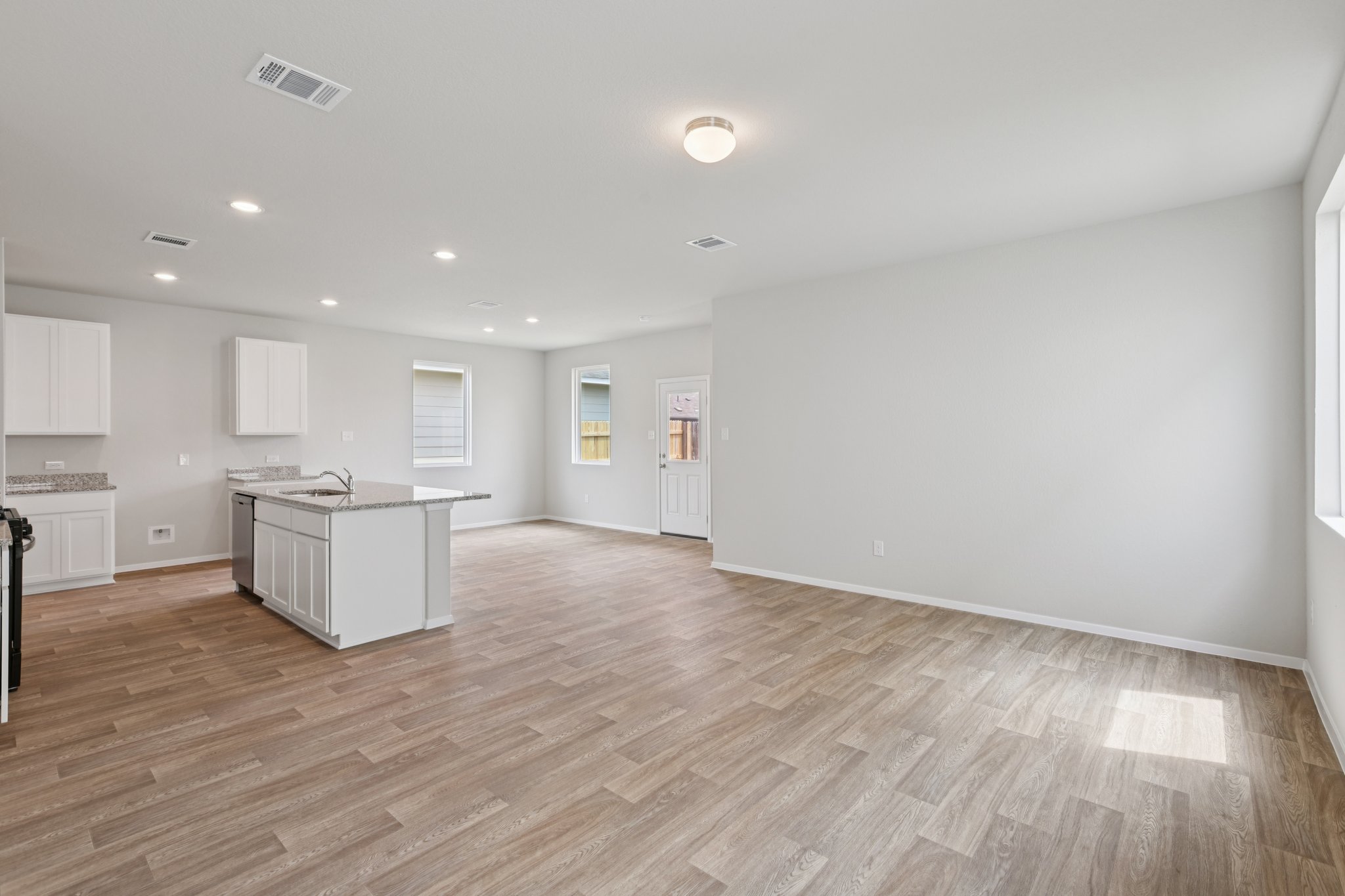 297 Jade Street Maxwell, TX 78656 - Photo 11 of 40 a view of kitchen with wooden floor