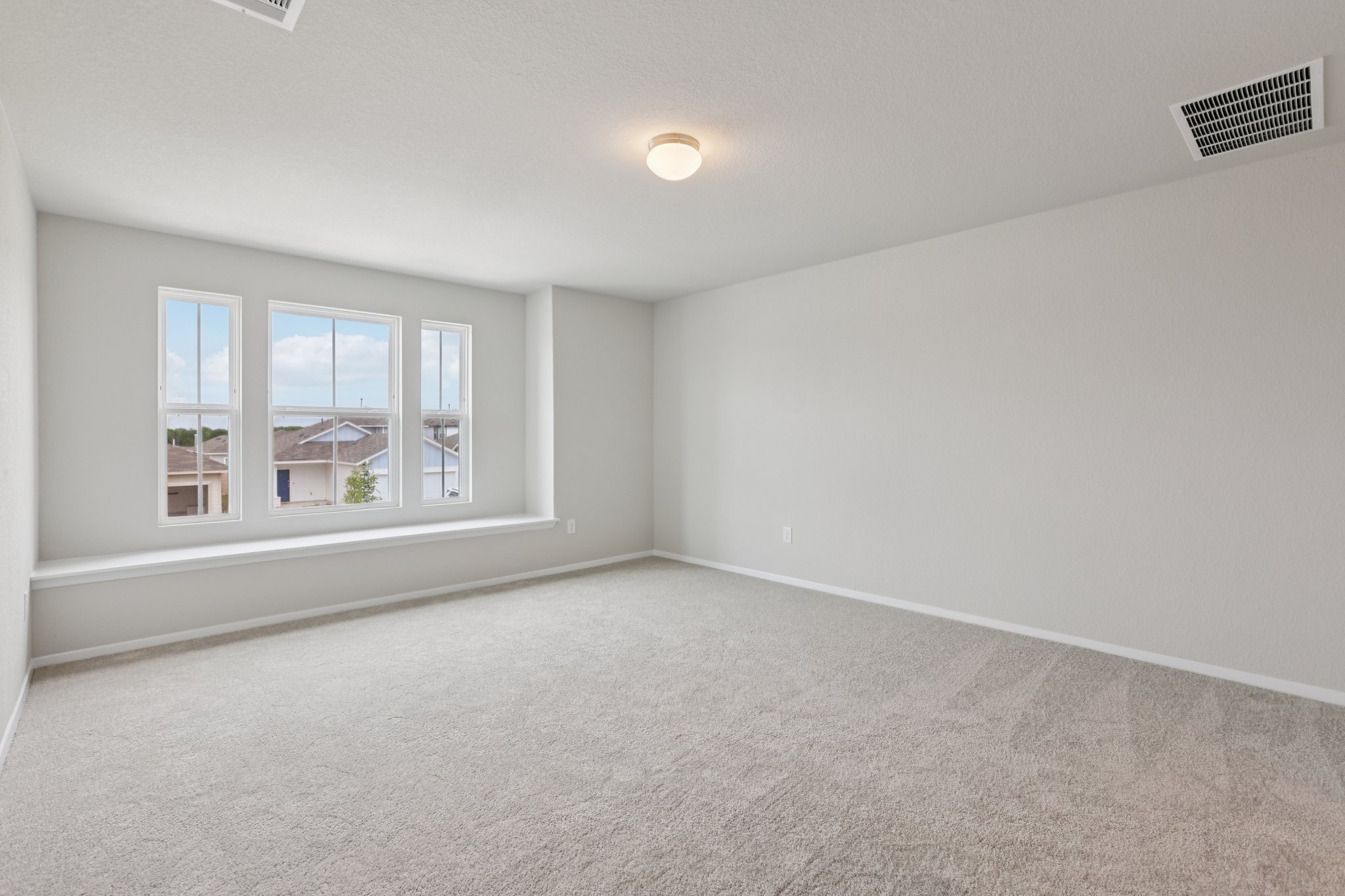297 Jade Street Maxwell, TX 78656 - Photo 16 of 40 an empty room with windows