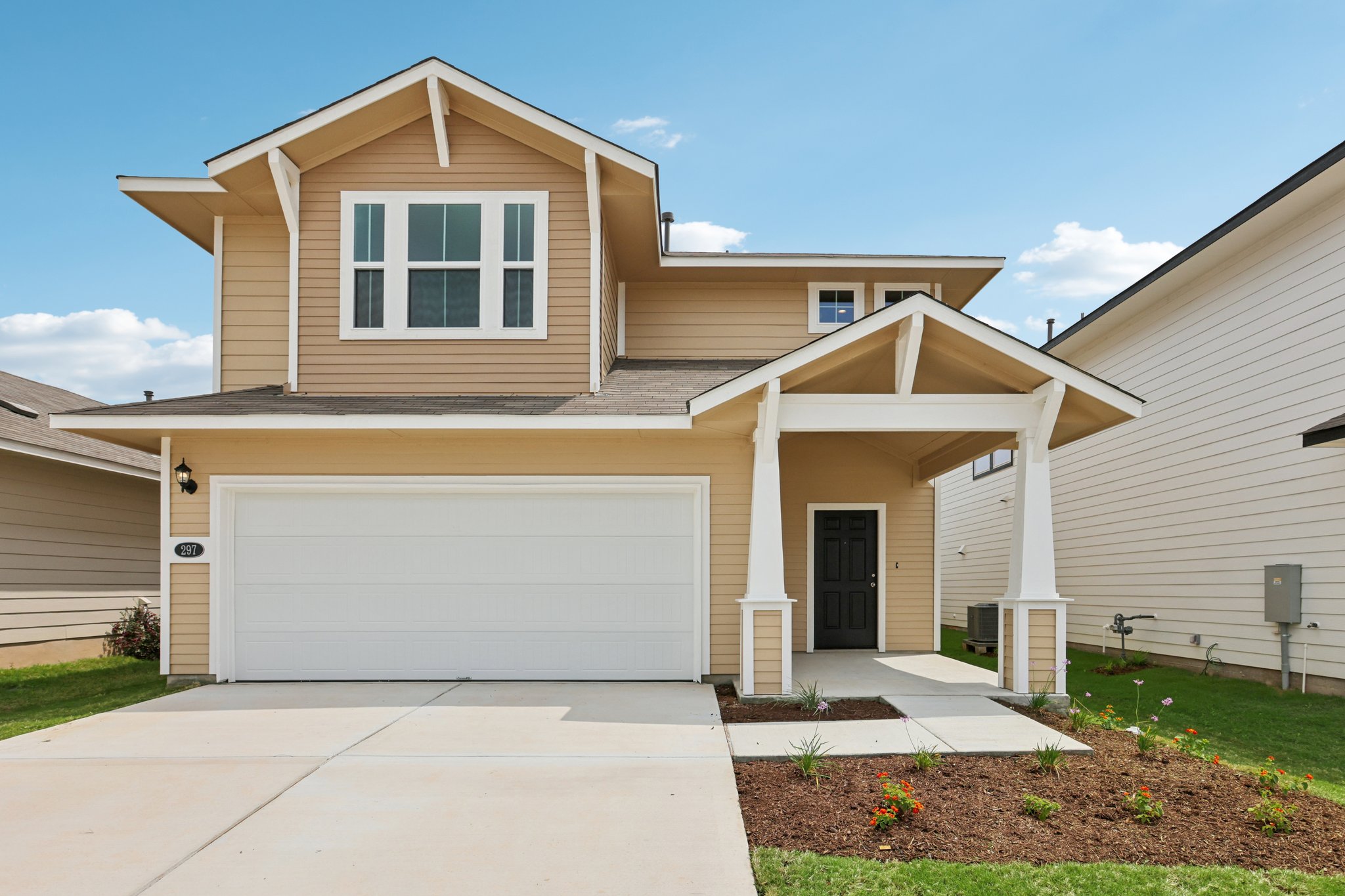 297 Jade Street Maxwell, TX 78656 - Photo 2 of 40 a front view of a house with garden
