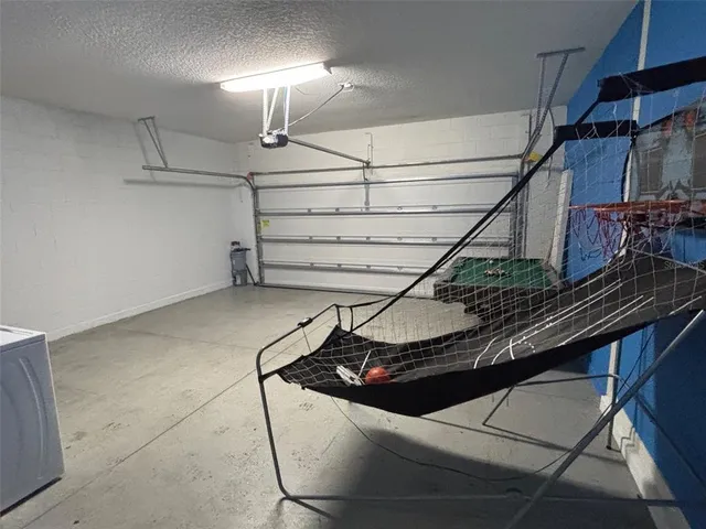 a view of entryway and kitchen