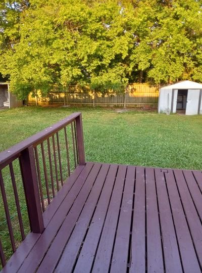 2041 Abingdon Drive La Vergne, TN 37086 - Photo 18 of 18 a view of deck with wooden floor and outdoor seating