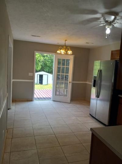 2041 Abingdon Drive La Vergne, TN 37086 - Photo 6 of 18 a living room with furniture and a fireplace