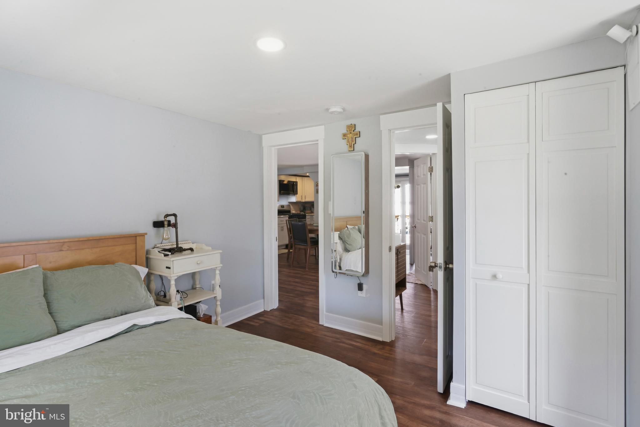 3700 Old Milford Mill Road Windsor Mill, MD 21244 - Photo 21 of 49 a bedroom with a bed and a refrigerator