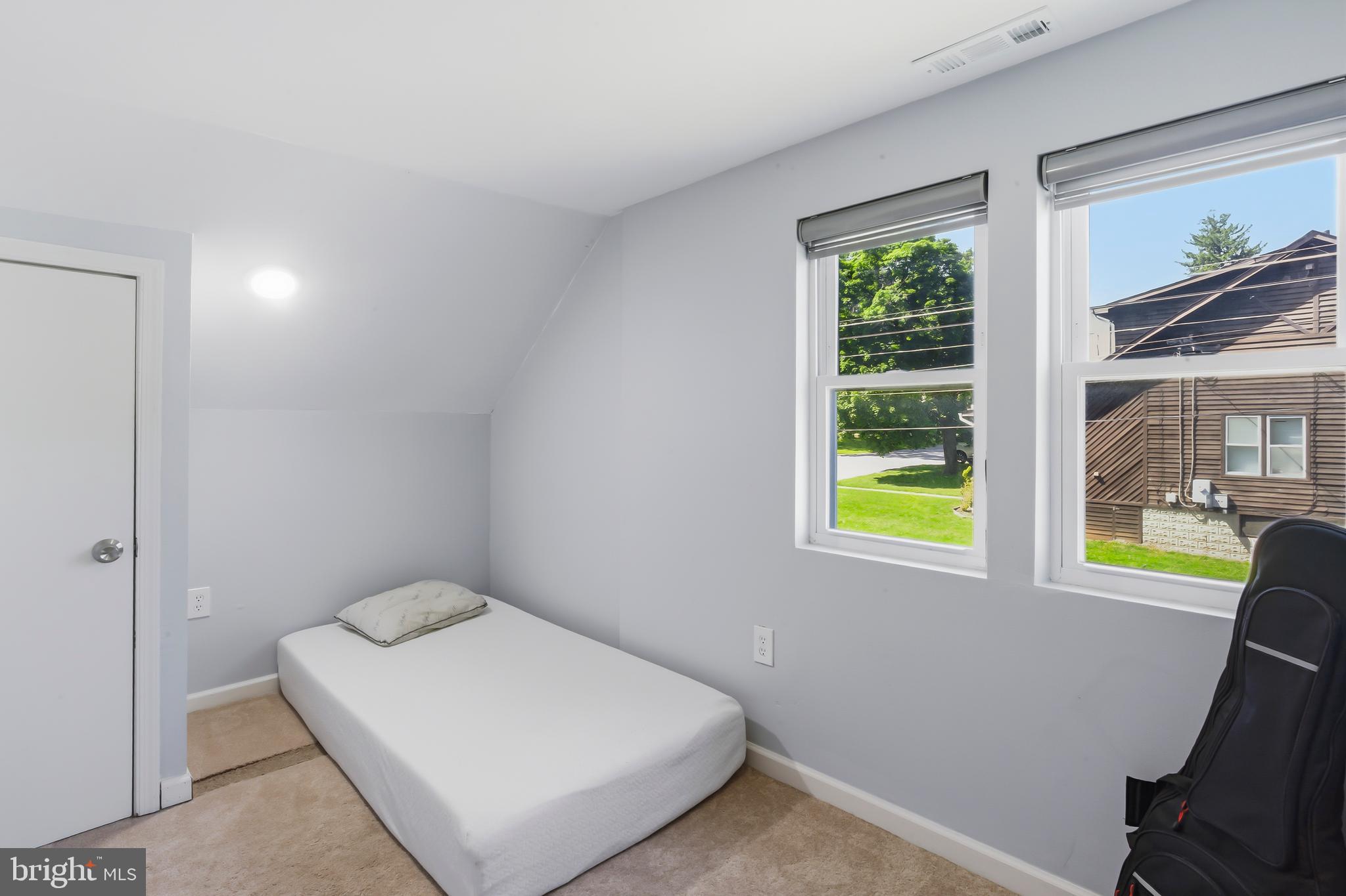 3700 Old Milford Mill Road Windsor Mill, MD 21244 - Photo 34 of 49 a view of a room that has a bed and a window in it
