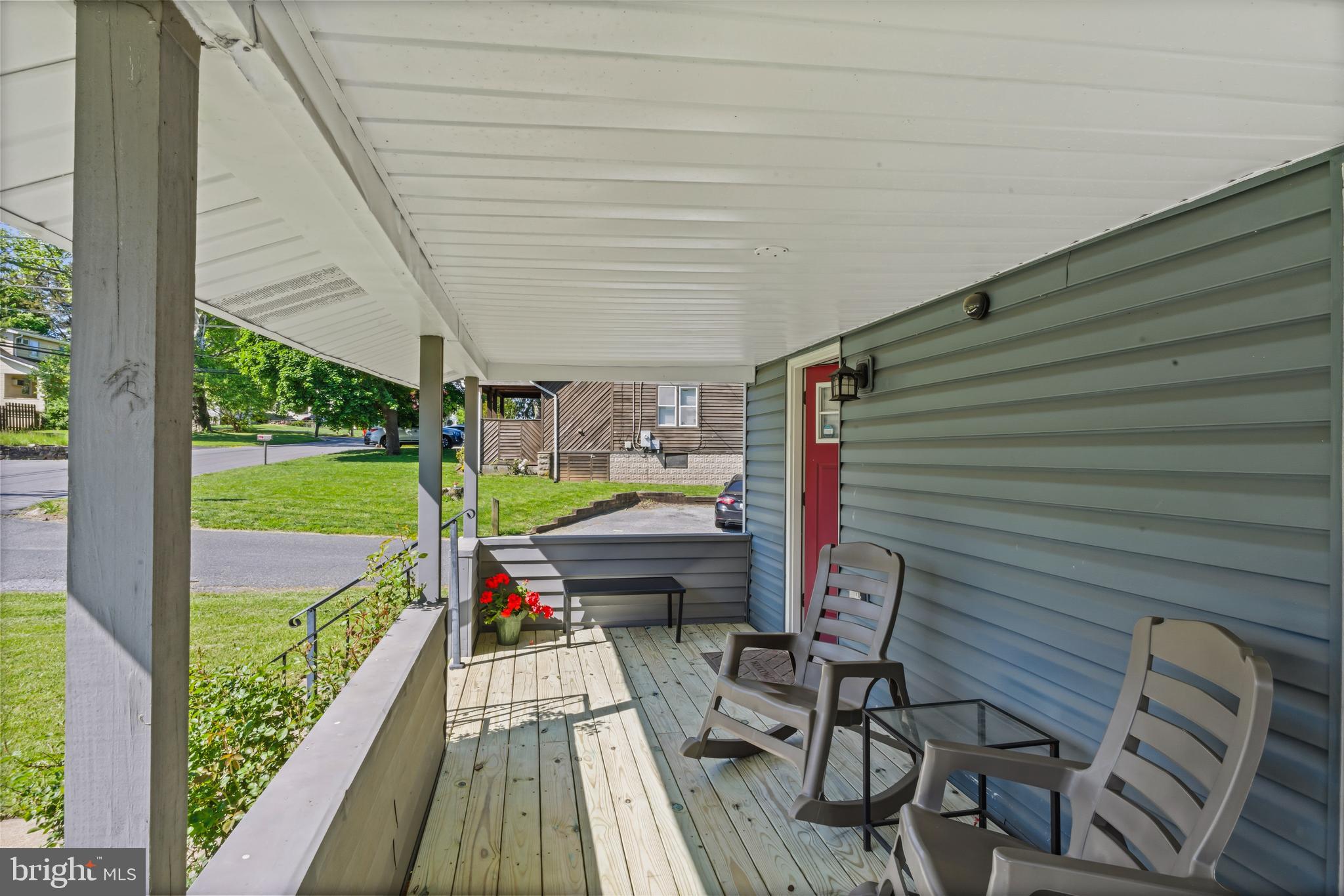 3700 Old Milford Mill Road Windsor Mill, MD 21244 - Photo 6 of 49 a view of balcony with wooden floor and outdoor seating