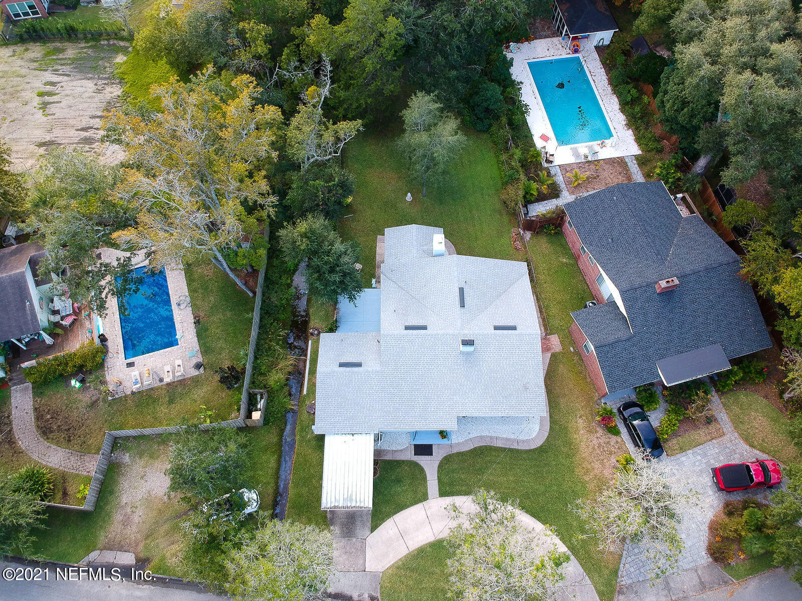 754 Old Hickory Road Jacksonville, FL 32207 - Photo 2 of 21 an aerial view of a house with a garden